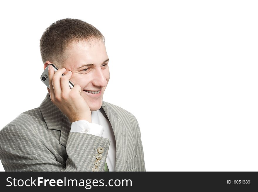 Young busunessman calling mobile phone