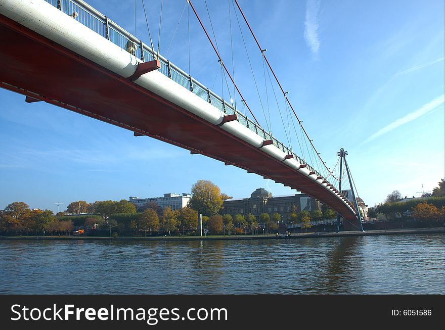Suspension bridge in river main, the city of Frankfurt. Suspension bridge in river main, the city of Frankfurt.