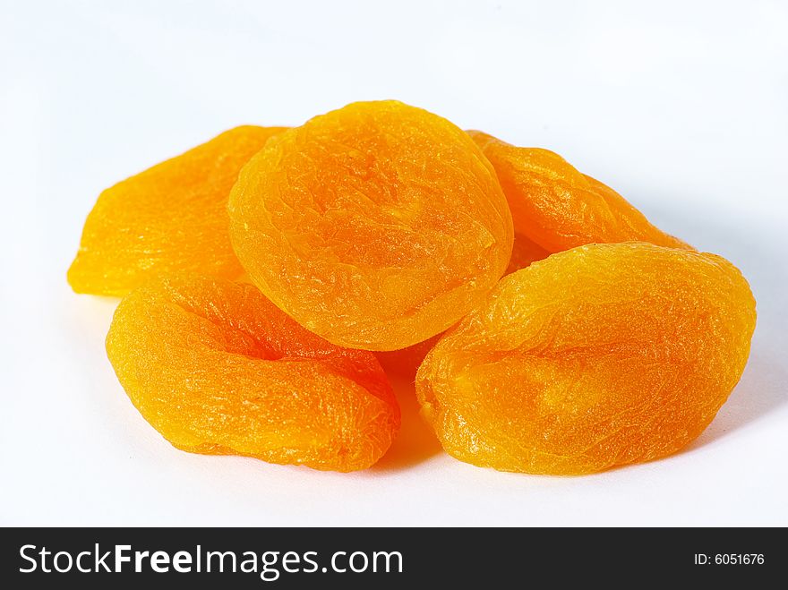 Dried apricot fruits isolated over white background