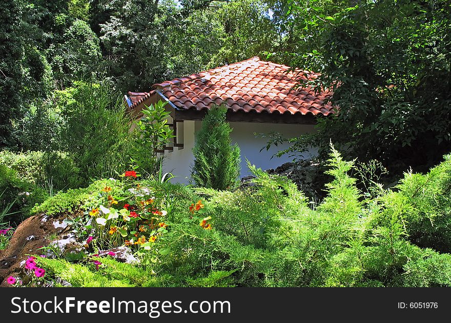 Small cottage among picturesque nature