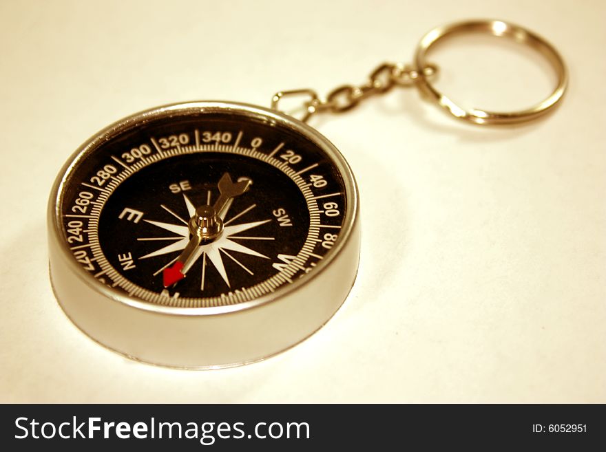 Black compass isolated on a white background