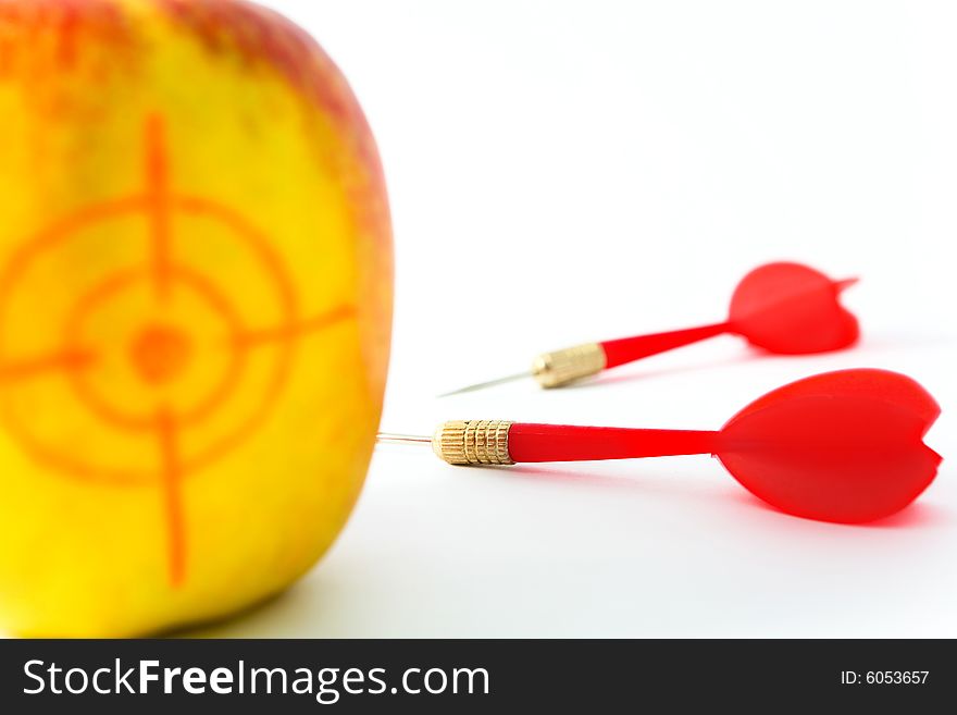 Yellow Apple with Darts closeup on White Background