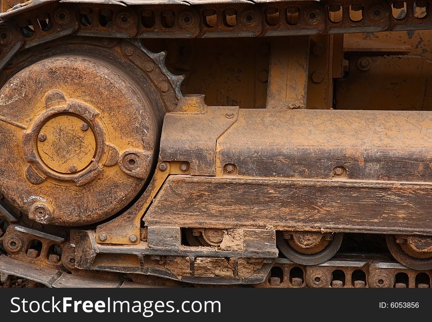 Cropped view of the wheel on a construction vehicle. Cropped view of the wheel on a construction vehicle.