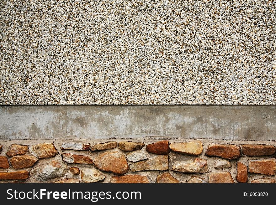 Stone wall with pebbles, stones and cement for background. Stone wall with pebbles, stones and cement for background