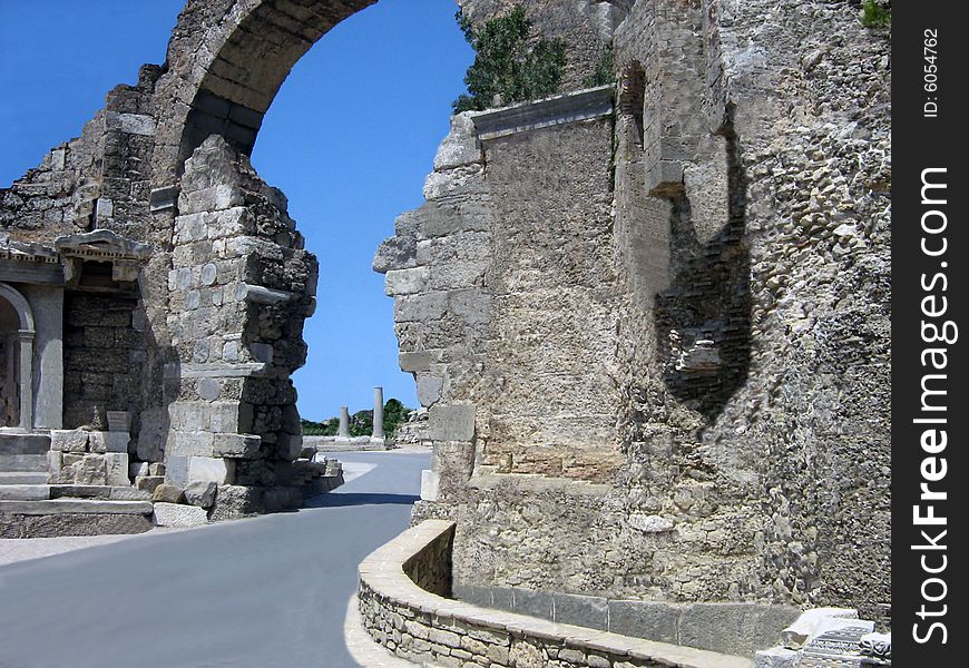 Antique city. Ruins of a gate of leaders in ancient city. Turkey.
Stone gate, ancient constructions, stone strengthenings. Antique city. Ruins of a gate of leaders in ancient city. Turkey.
Stone gate, ancient constructions, stone strengthenings