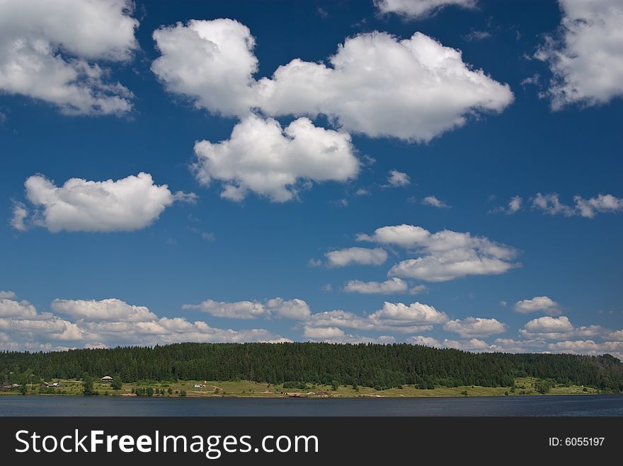 Cloudy river landscape. Photographed from cruise ship.