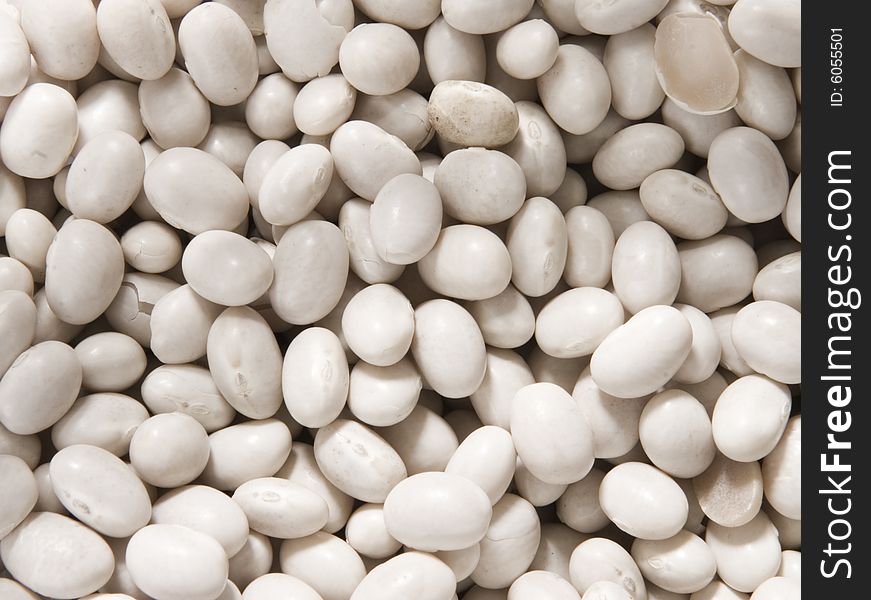 Group of white beans looking like small round stones