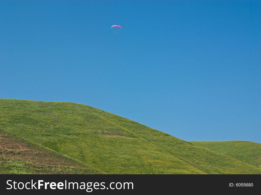 Simple hill landscape with parachute.