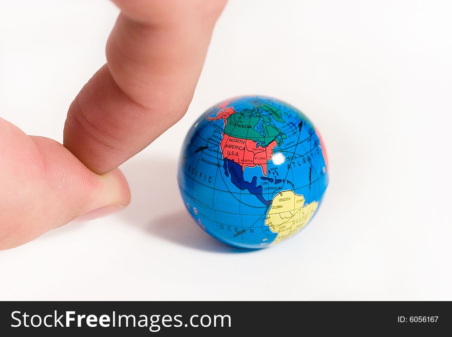 Fingers Ready To Push A Globe