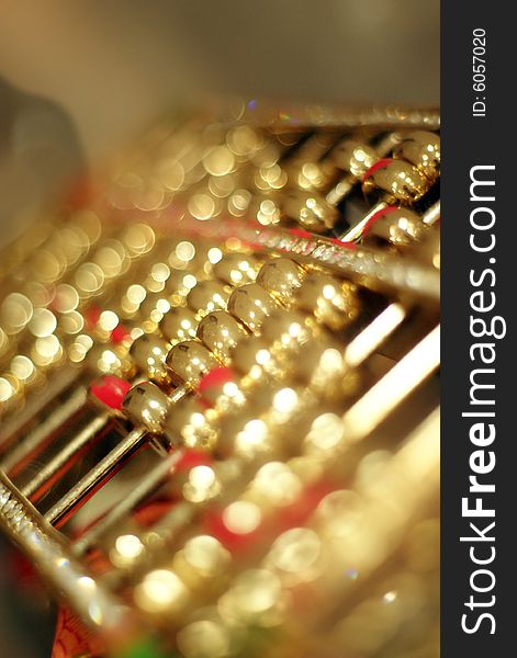 A closeup shot of a Golden Abacus
