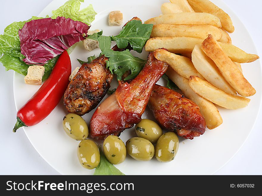 Fast food image hicken legs and salad. Fast food image hicken legs and salad