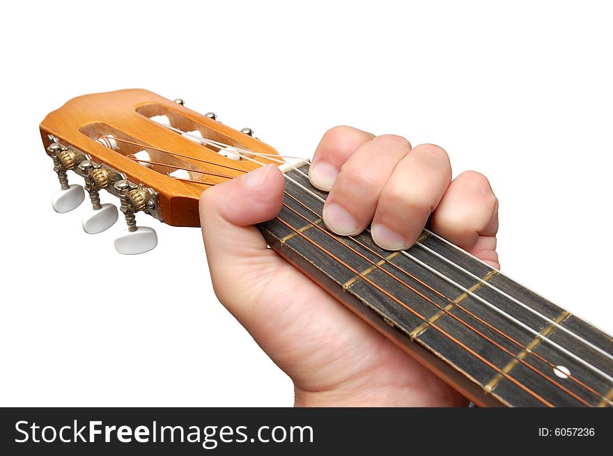 Acoustic guitar isolated over a white background