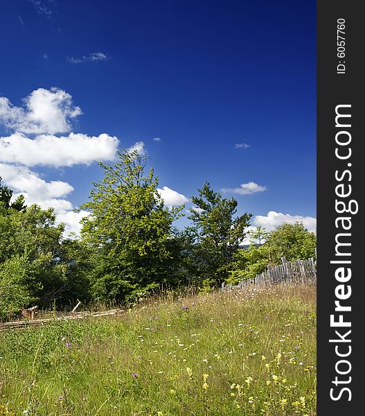 Green hills and beautiful summer sky with clouds