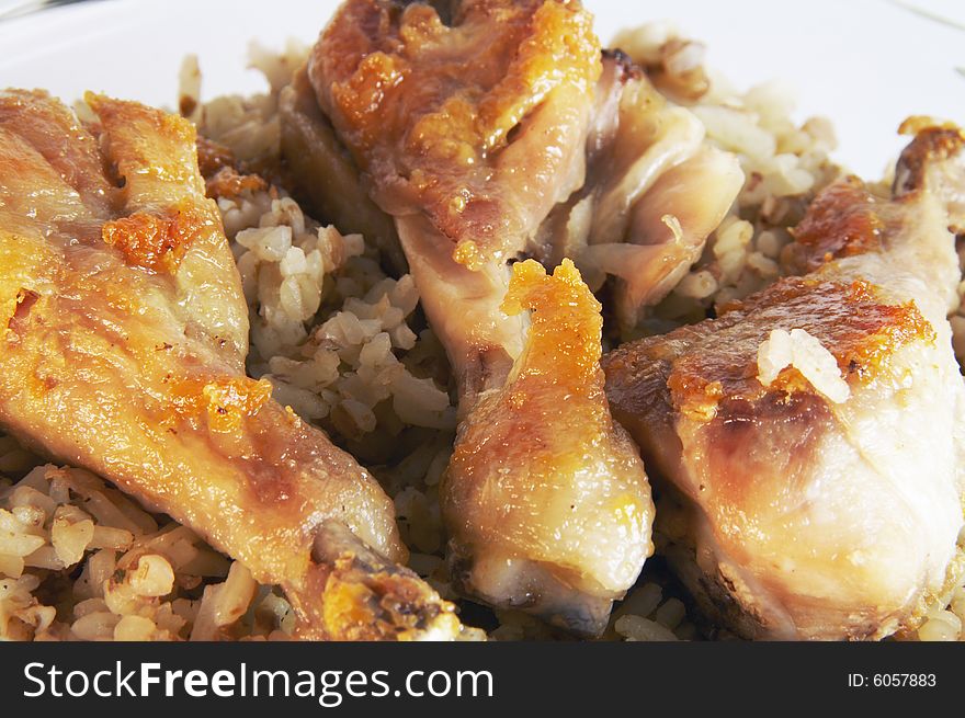 Three fried chicken legs and rice. Three fried chicken legs and rice