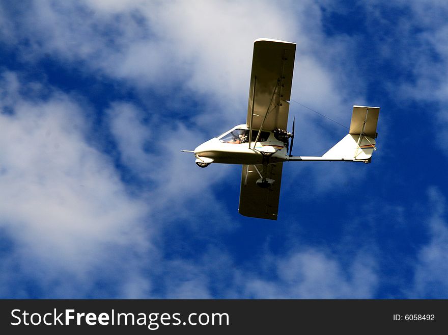 Private aircraft and  blue sky. Private aircraft and  blue sky