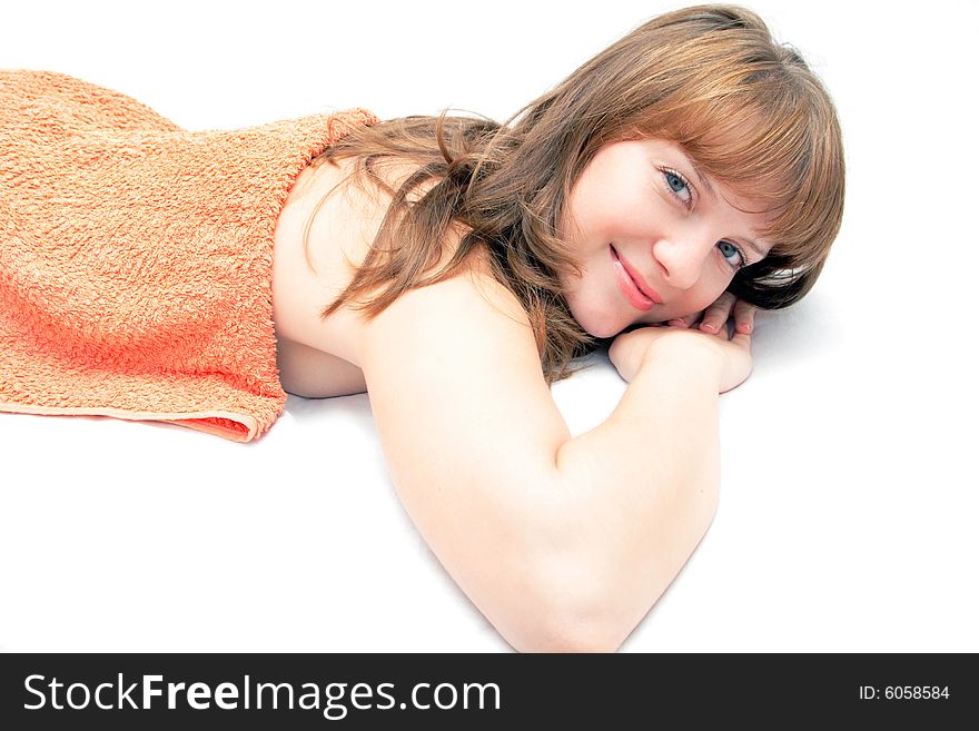 Young pretty woman relaxing and smiling at the spa. Young pretty woman relaxing and smiling at the spa