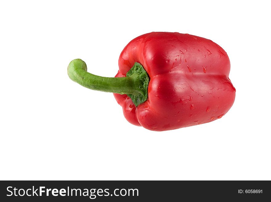 Red pepper with a green pod on a white background