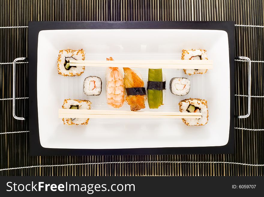 A plate with different kinds of sushi