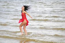 Happy Woman Dancing On The Beach Stock Photo Happy Woman Dancing On The Beach Stock Photo