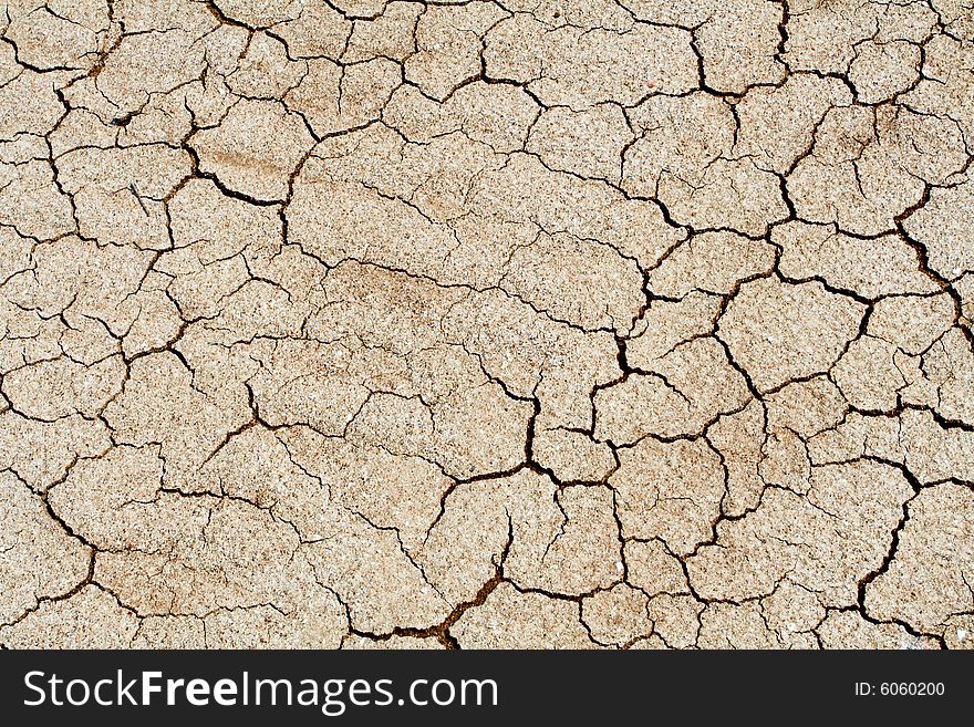 Dried climate, fissured cracked earth and sand. Dried climate, fissured cracked earth and sand