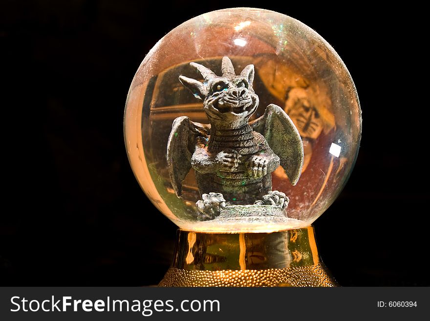 Small Gargoyle captured in a small globe. Small Gargoyle captured in a small globe