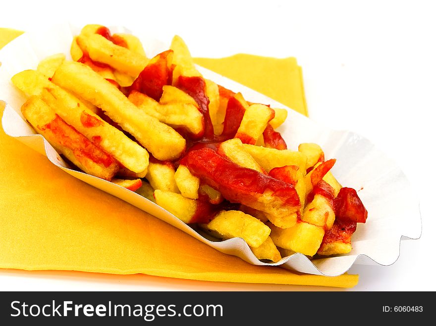 French fries with ketchup - isolated on white background.