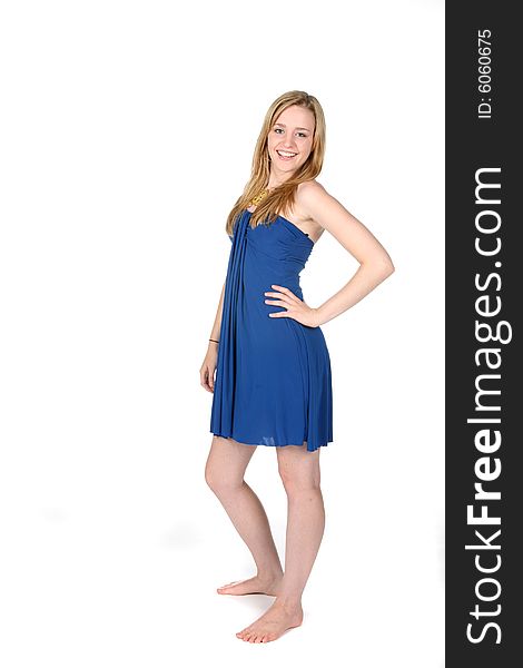 Pretty young woman in short blue dress