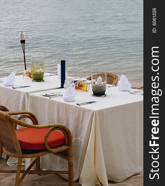 Table at a restaurant overlooking ocean views. Table at a restaurant overlooking ocean views.