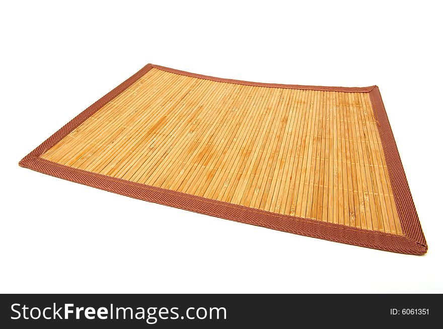 Wooden mat sheathed by the cloth