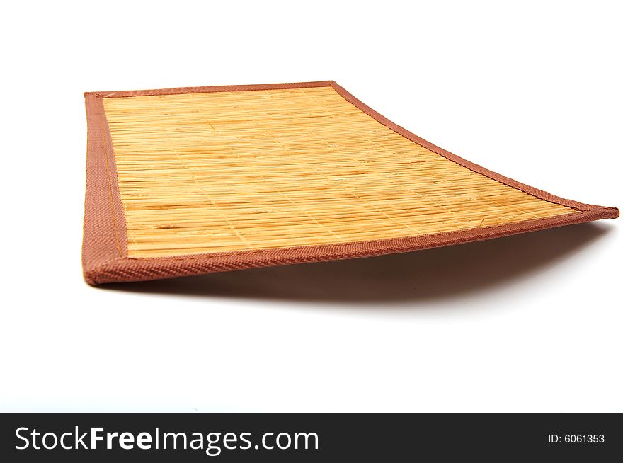 Wooden mat sheathed by the cloth