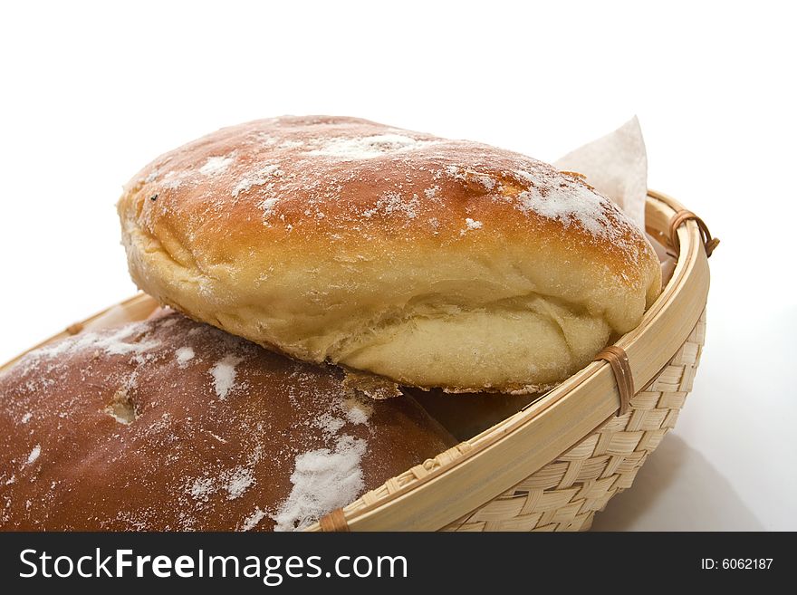 Fresh baked rolls on white background