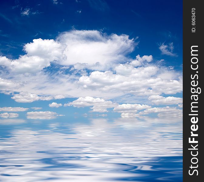 Blue sky over water background