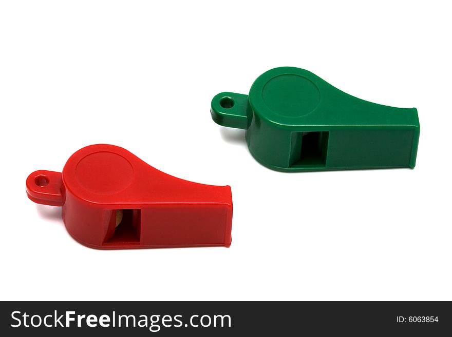 Red and green whistle on a white background