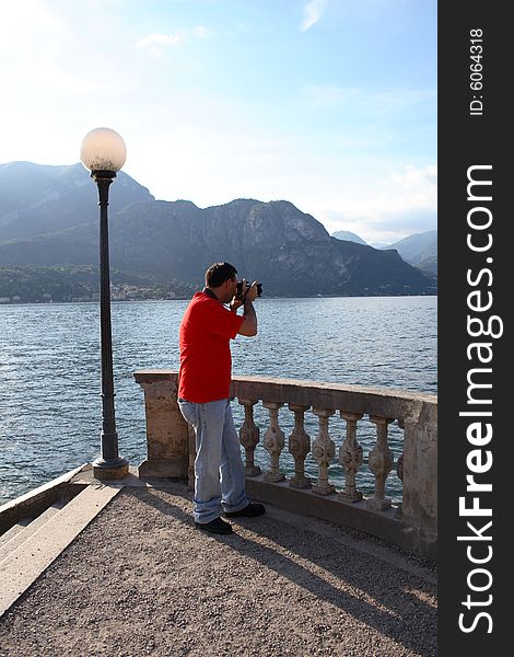 The man on the lake shore photographer