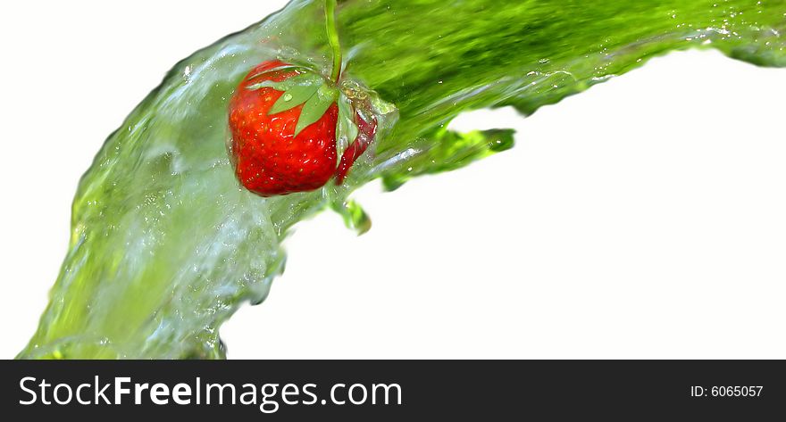 Red color  berry of  strawberry in  stream of water. Red color  berry of  strawberry in  stream of water