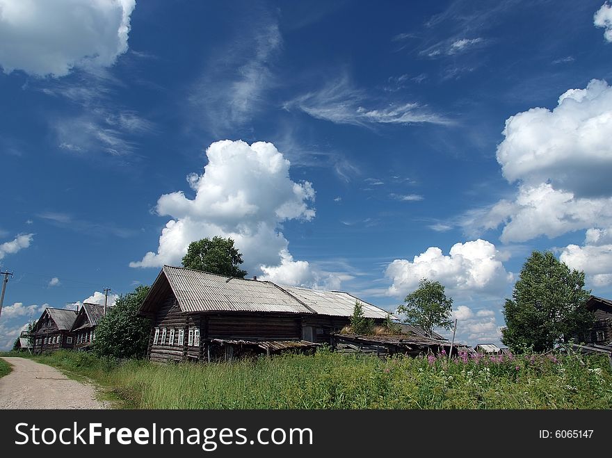 The russian village. summer sky and clouds. The russian village. summer sky and clouds.