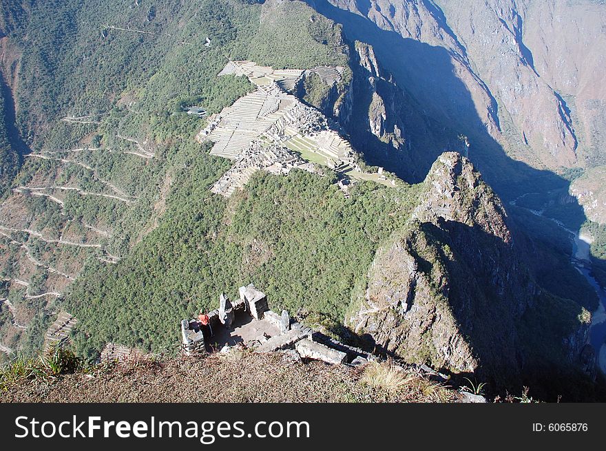This is a shot of the fabled city of machu-picchu from atop of the sacred mountain huayna-picchu. This is a shot of the fabled city of machu-picchu from atop of the sacred mountain huayna-picchu