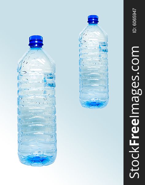 Recycling bottles on blue background