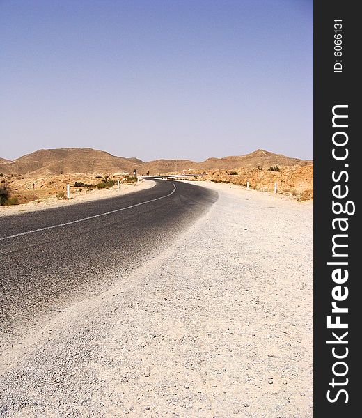 Desert road in the middle of Tunisia. Desert road in the middle of Tunisia.