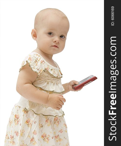 Little baby girl holds red cell phone. Little baby girl holds red cell phone