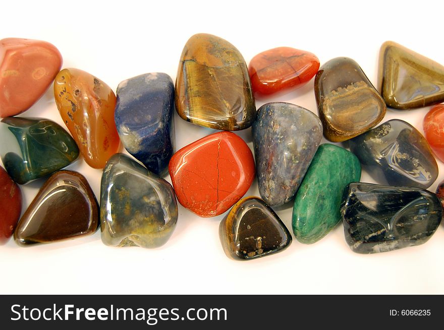 Colorfully stones on white background