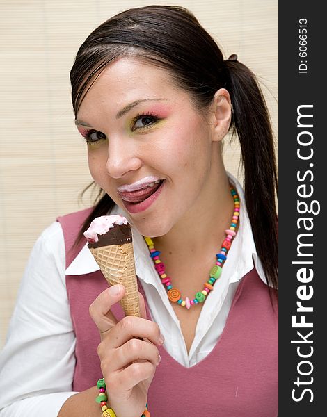 Attractive brunette woman with ice cream. Attractive brunette woman with ice cream