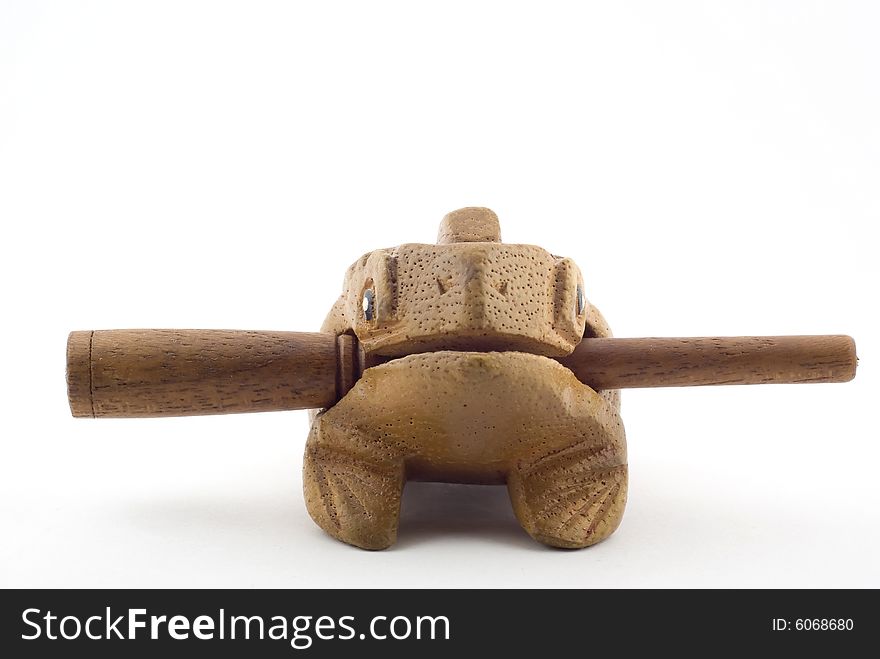 Ethnic toy- wooden frog from Canarian islands