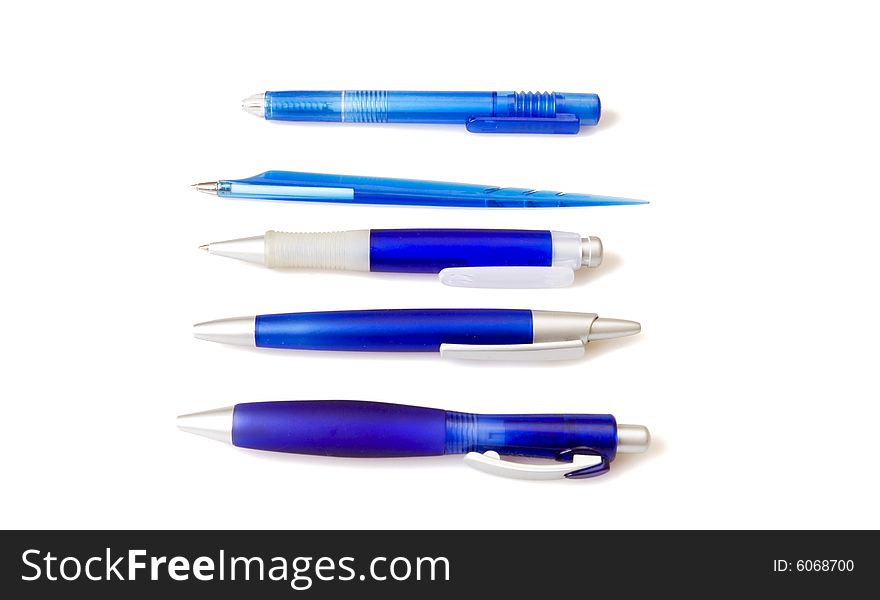 Blue pens on white ground