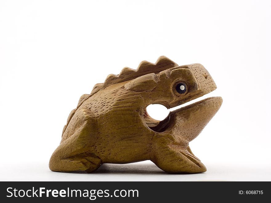 Ethnic toy- wooden frog from Canarian islands