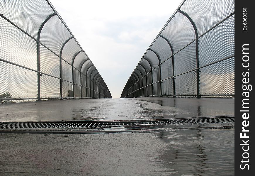 Sky bridge on a rainy day. Horizontally framed photo. Sky bridge on a rainy day. Horizontally framed photo.