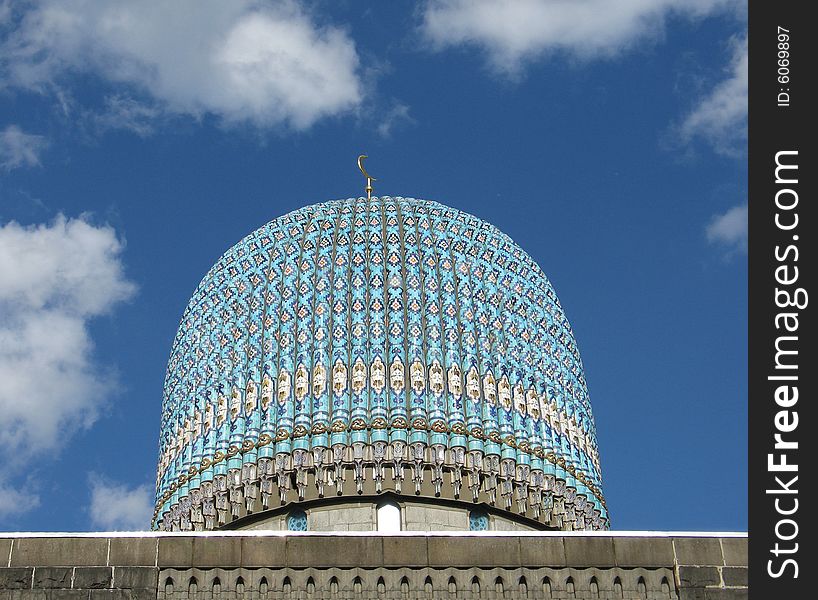 Dome to mosques on background blue sky