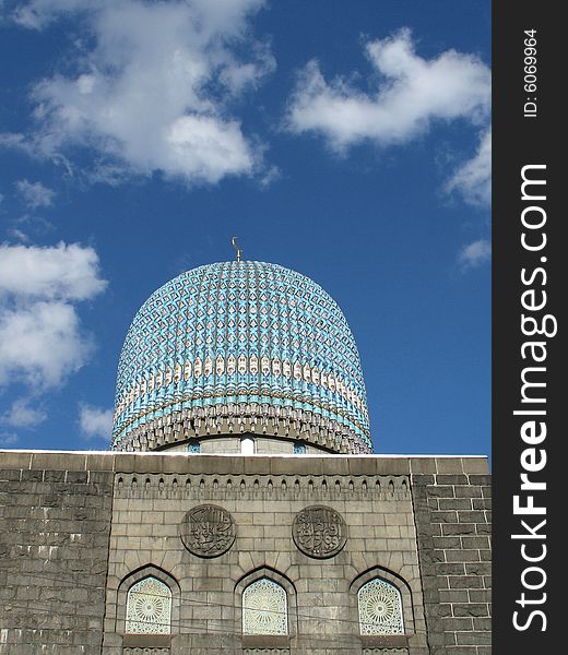 Dome to mosques on background blue sky