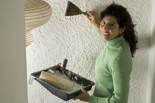 Woman With A Paint Scraper - Vertical Stock Photos Woman With A Paint Scraper - Vertical Stock Photos
