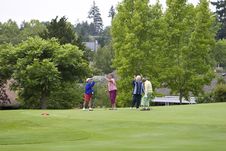 Women Playing Golf Stock Photo